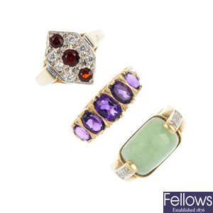A selection of four gem-set dress rings.