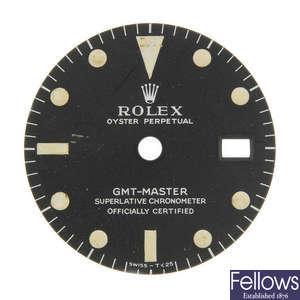 ROLEX - a matt black Singer dial with white writing for a GMT-Master. 