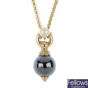 A cultured pearl and hematite pendant. 