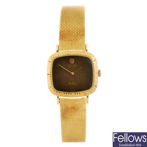 ROLEX - a lady's 18ct gold Cellini bracelet watch.