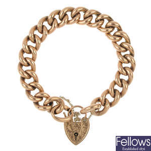 An early 20th century 9ct gold bracelet with heart padlock.