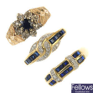 A selection of four 9ct gold sapphire and diamond rings.