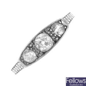 An early 20th century platinum diamond three-stone ring.