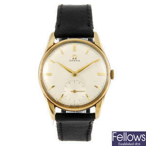 OMEGA - a gentleman's 9ct gold wrist watch.