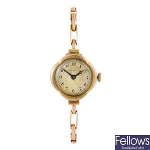 ROLEX - a lady's 9ct gold bracelet watch.