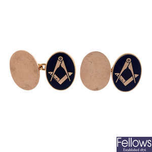 A pair of 9ct gold and enamel Masonic cufflinks.