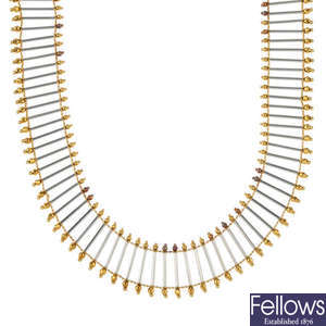 An 18ct gold necklace and bracelet set.