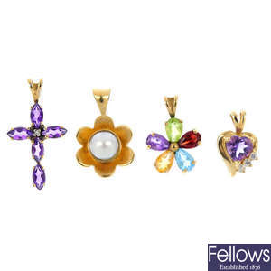 A selection of nine gem-set pendants.