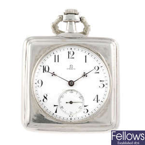 A white metal open face pocket watch by Omega.