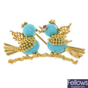 A reconstituted turquoise and gem-set novelty brooch.