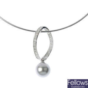 MIKIMOTO - a South Sea cultured pearl and diamond pendant with chain.