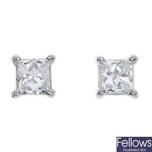 A pair of 18ct gold square-shape diamond ear studs. 