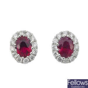 A pair of ruby and diamond cluster ear studs. 