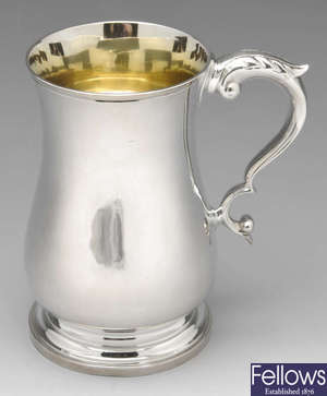 A modern silver mug.