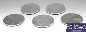 A set of five modern silver mounted coasters.