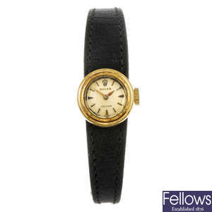 ROLEX - a yellow metal lady's Precision wrist watch.