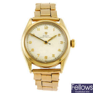 ROLEX - a 9ct gold gentleman's Oyster Precision bracelet watch.