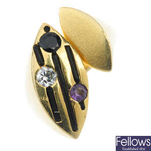 A diamond, enamel and gem-set dress ring.