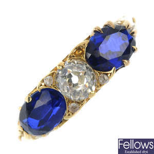 An 18ct gold synthetic sapphire and diamond ring.