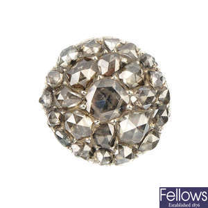 A composite diamond cluster ring.