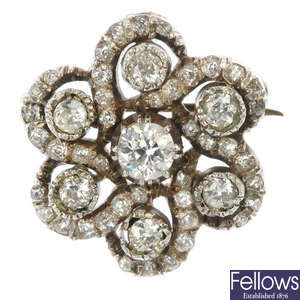 A late 19th century gold diamond cluster brooch.