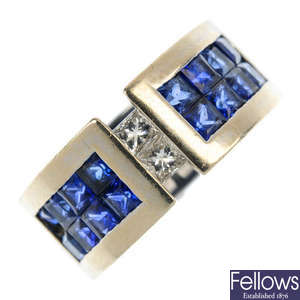 A diamond and sapphire band ring.