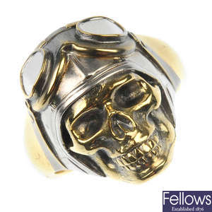 THEO FENNELL - an 18ct gold 'Lost Flyer Skull' ring.