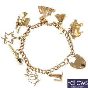 An early 20th century gold charm bracelet.
