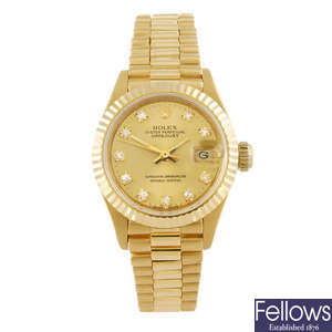 ROLEX - a lady's 18ct gold Oyster perpetual Datejust bracelet watch. 