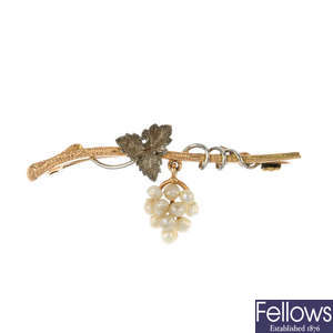 An early 20th century 15ct gold and platinum foliate seed pearl bar brooch.