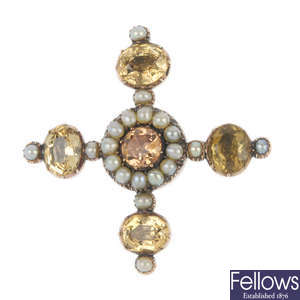 A late 19th century topaz, citrine and split pearl cross brooch.