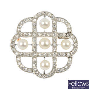 An early 20th century platinum and gold cultured pearl and diamond brooch. 