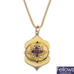 A late 19th century 9ct gold ruby and diamond pendant. 