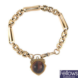 A fancy-link bracelet and 9ct gold tiger's-eye clasp.