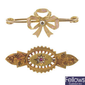 Two early 20th century gold gem-set brooches.