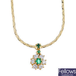 An 18ct gold emerald and diamond necklace.