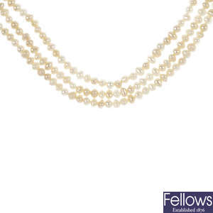 A seed pearl three-row necklace, with diamond and sapphire clasp.
