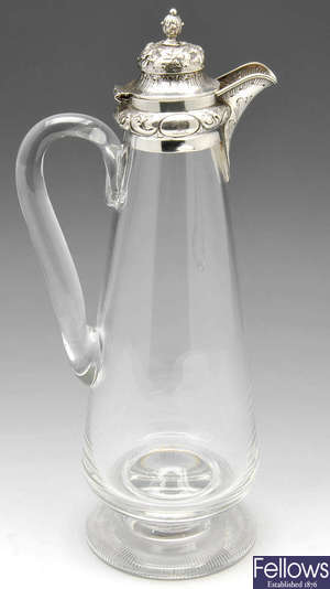 A Victorian silver mounted claret jug.