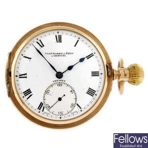 A 9ct gold half hunter pocket watch by Thomas Russell. 