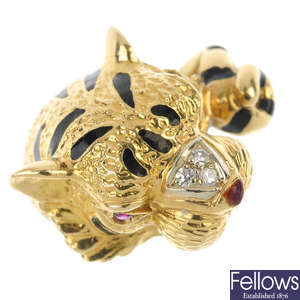 A mid 20th century 18ct gold enamel, diamond and ruby tiger ring.