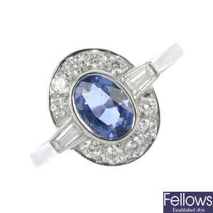 A sapphire and diamond panel ring.