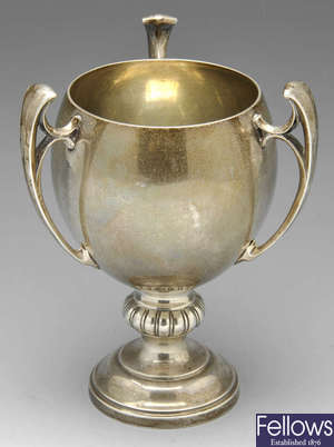 An Edwardian silver cup.