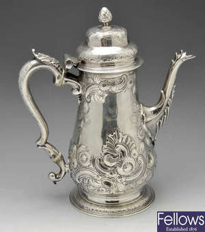 A George III silver coffee pot. 