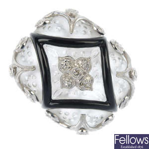 A diamond, onyx and rock crystal dress ring.