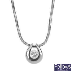 PAUL SPURGEON - a platinum diamond single-stone pendant.