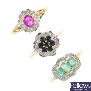 A selection of three 9ct gold diamond and gem-set cluster rings.