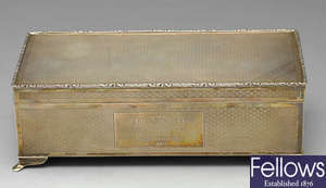 A 1970's silver mounted cigarette box, with presentation inscription.
