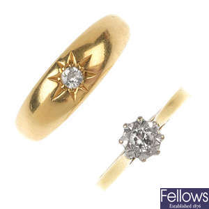 Two 18ct gold diamond single-stone rings.