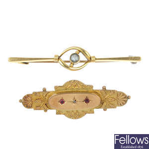 A selection of four early 20th century gold brooches.