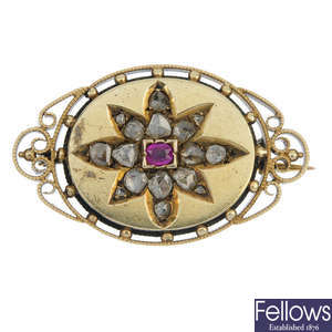 An late 19th century 18ct gold diamond and ruby brooch.